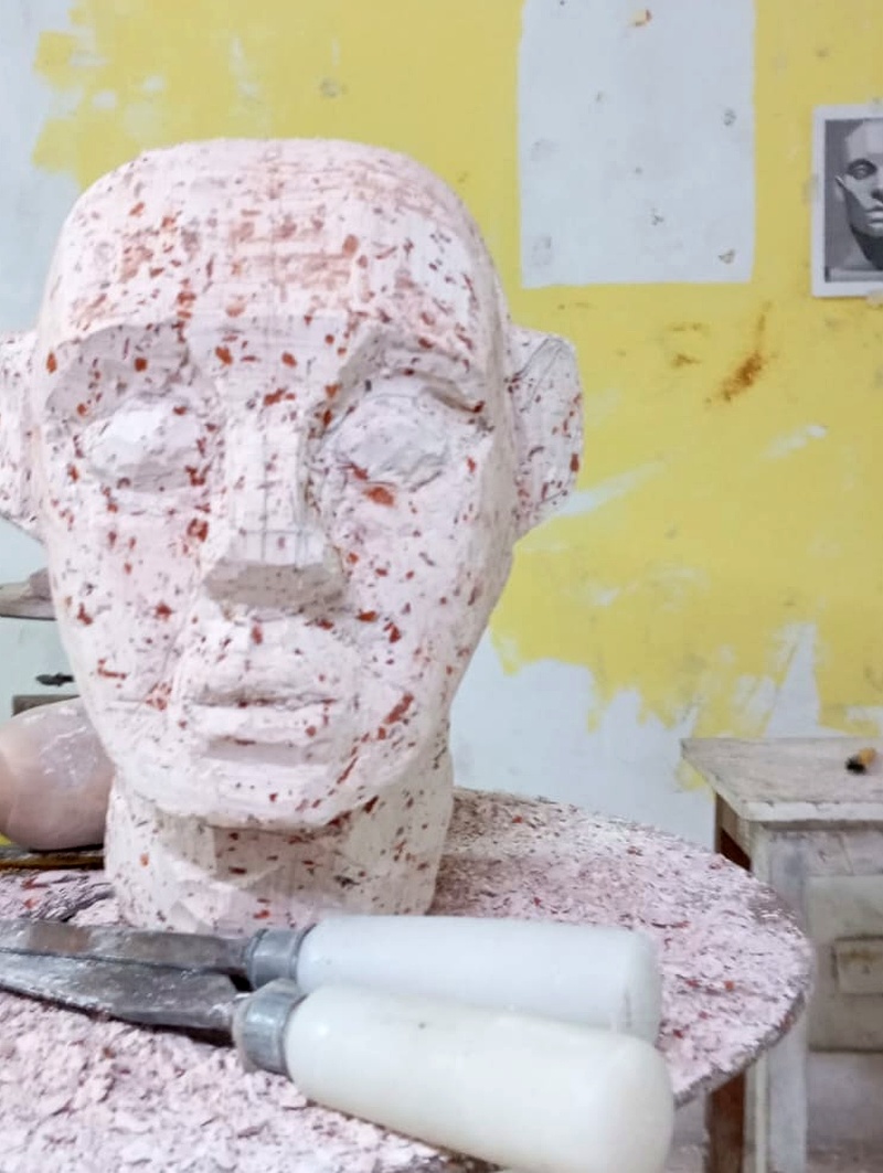 Terracotta-Inlay Head Study — frontal direct carving and planar study